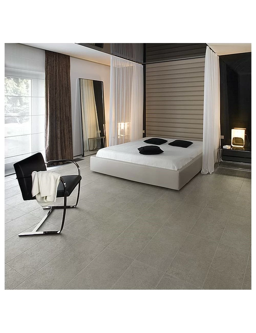 cement effect stoneware tile laid in bedroom floor