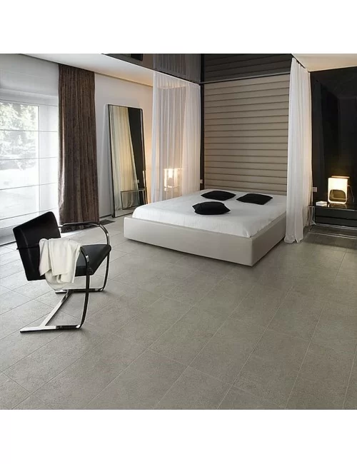 cement effect stoneware tile laid in bedroom floor
