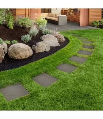 20mm thick tile ocean black laid on grass