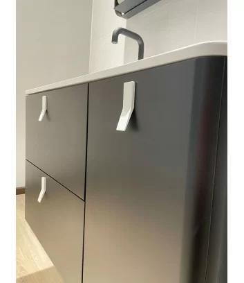 detail matt black bathroom cabinet with white handles