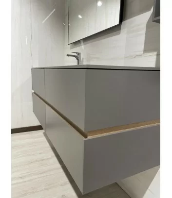 detail of drawers with oak groove in dove-coloured bathroom cabinet