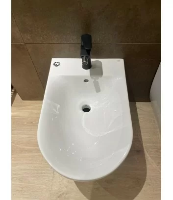 detail of glossy white floor-standing bidet by Rak Des