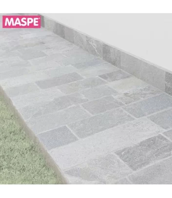 paving around the perimeter of the house with natural stone Caravaggio running - Maspe