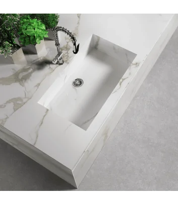 cave forte A grande lastra effetto marmo lucido posata come top cucina con lavabo integrato