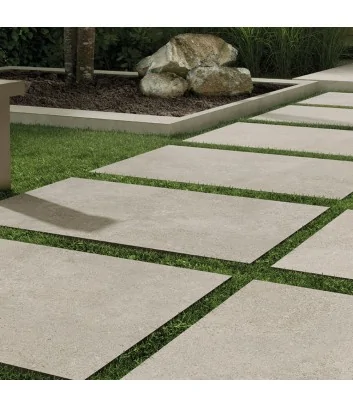 Outdoor flooring with stone-effect tiles from the Eterea line ivory colour