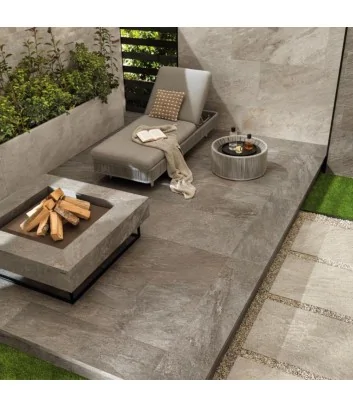 Outdoor flooring with lead-coloured stone-effect tiles from the Norde range