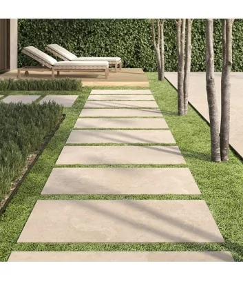 walkway paved with crosscut beige travertino range stone-effect outdoor tiles