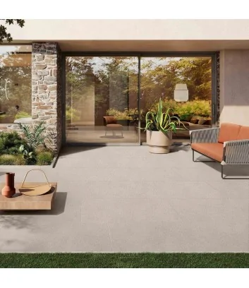 cortile esterno con piastrella effetto pietra 2 cm color perla linea arenite